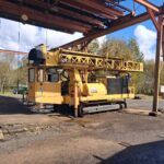 Atlas Copco ROC or Pit Viper series rotary blasthole drill rig.