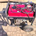 3 Briggs & Stratton Elite Series portable petrol generator with a tubular metal frame and a pull handle